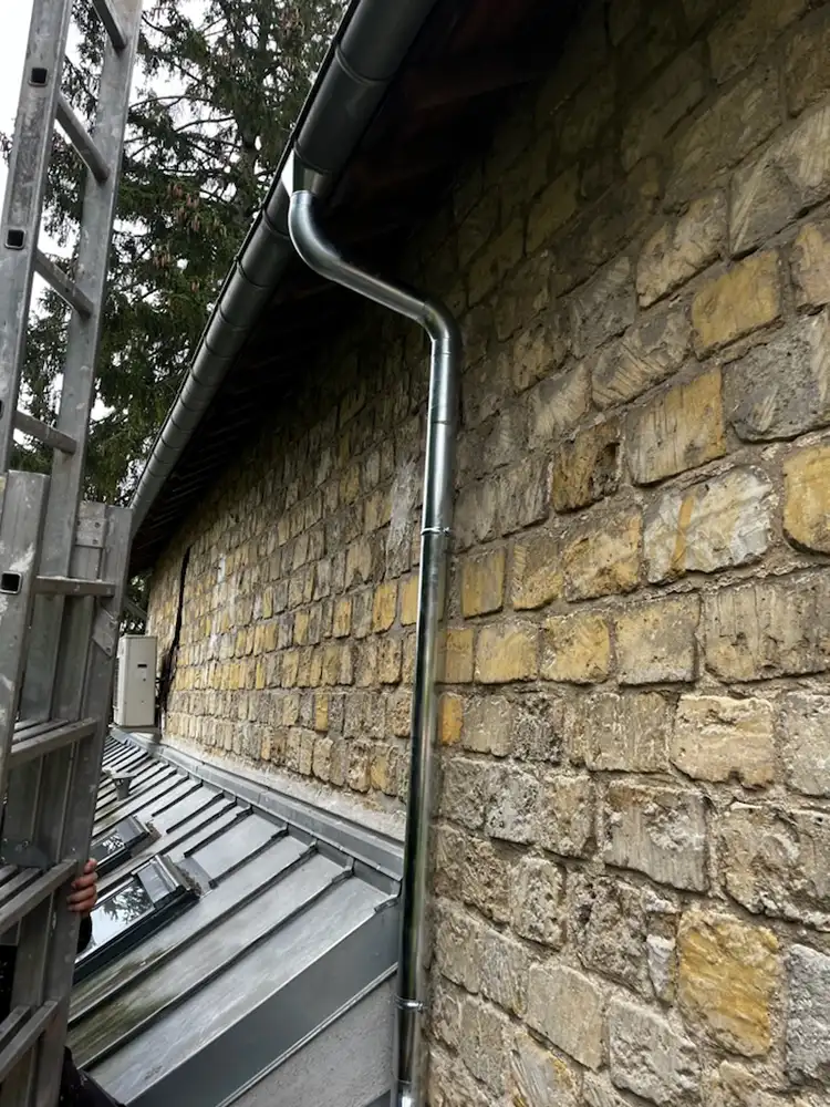 pose descente gouttiere parmain